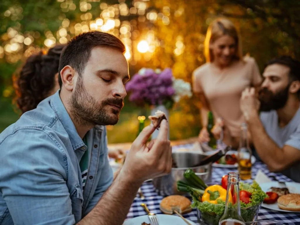 Group of friends together on a picnic outdoors